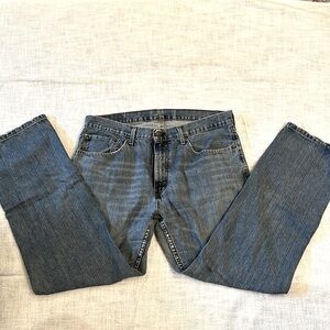 Levi’s preowned distressed 36” x 32” bootleg jeans.